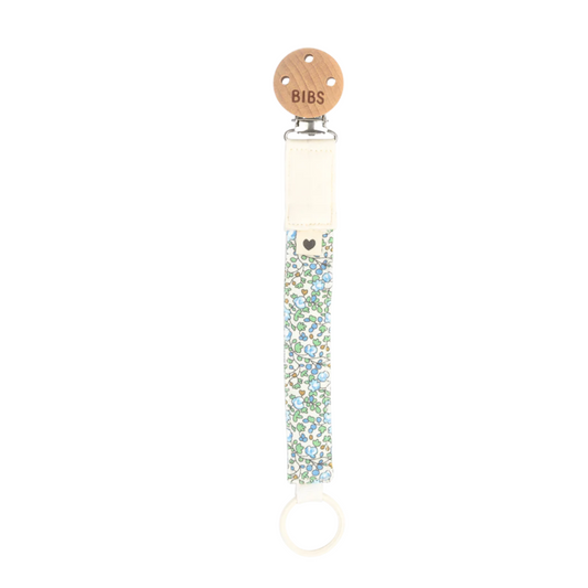 BIBS pacifier clip with floral pattern on a white background