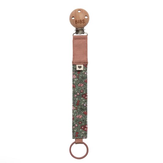 BIBS pacifier clip with floral pattern on a white background