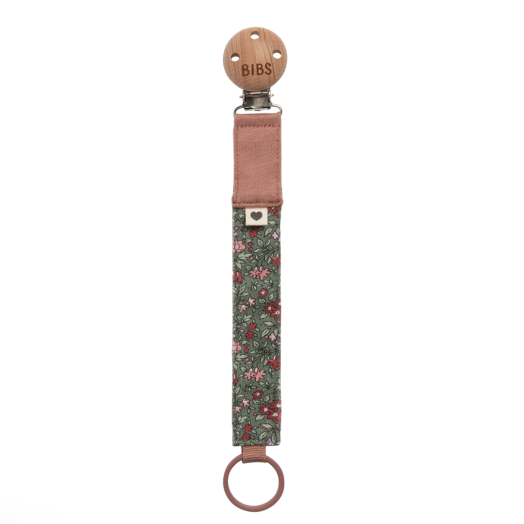 BIBS pacifier clip with floral pattern on a white background