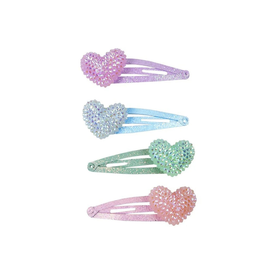 Set of four bedazzled heart-shaped hair clips, one purple, one blue, one mint green and one pink from Great Pretenders