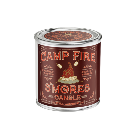 Campfire S'mores candle in a tin with a label on a white background