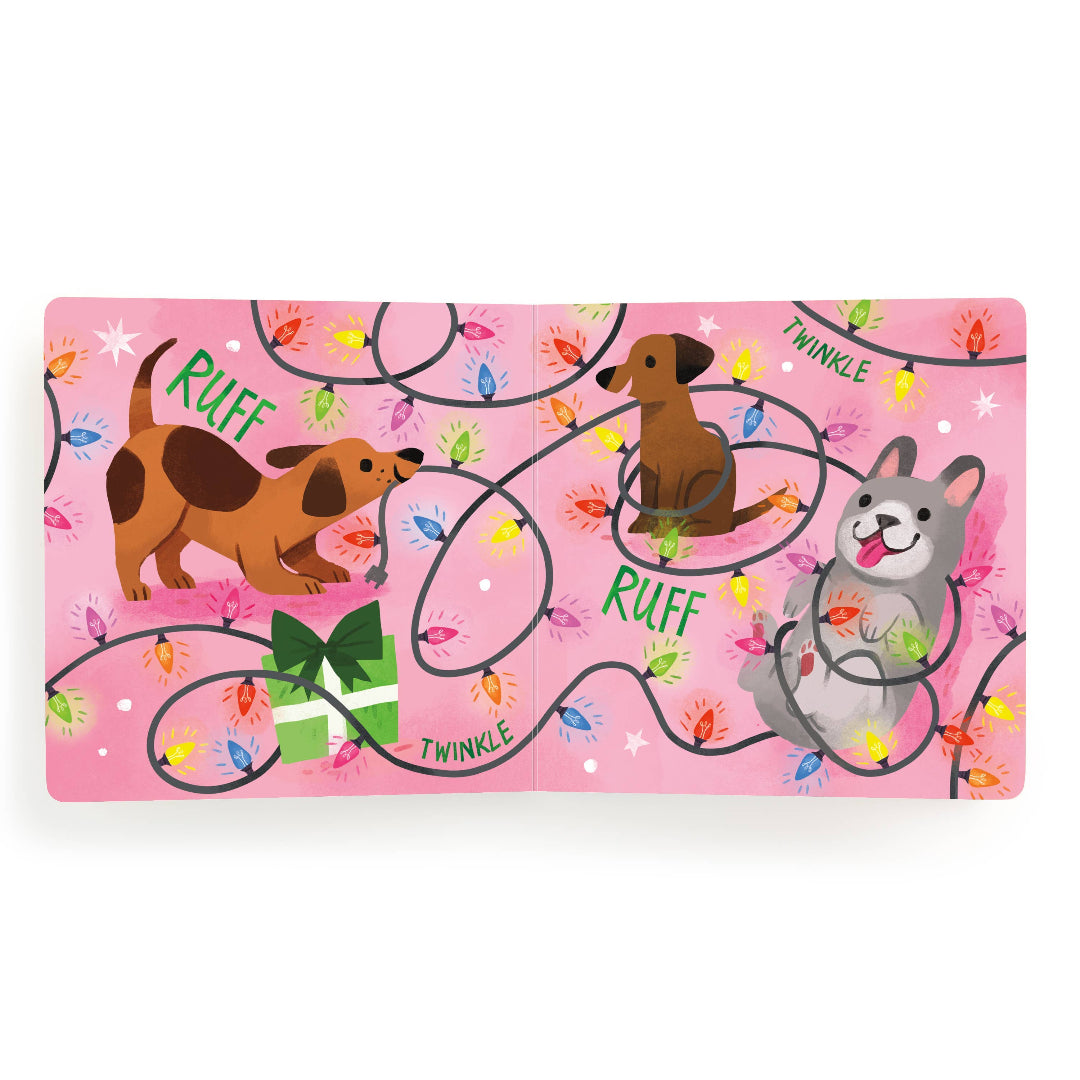 Pink book page with cartoon dogs and decorative chirstmas  elements on a white background