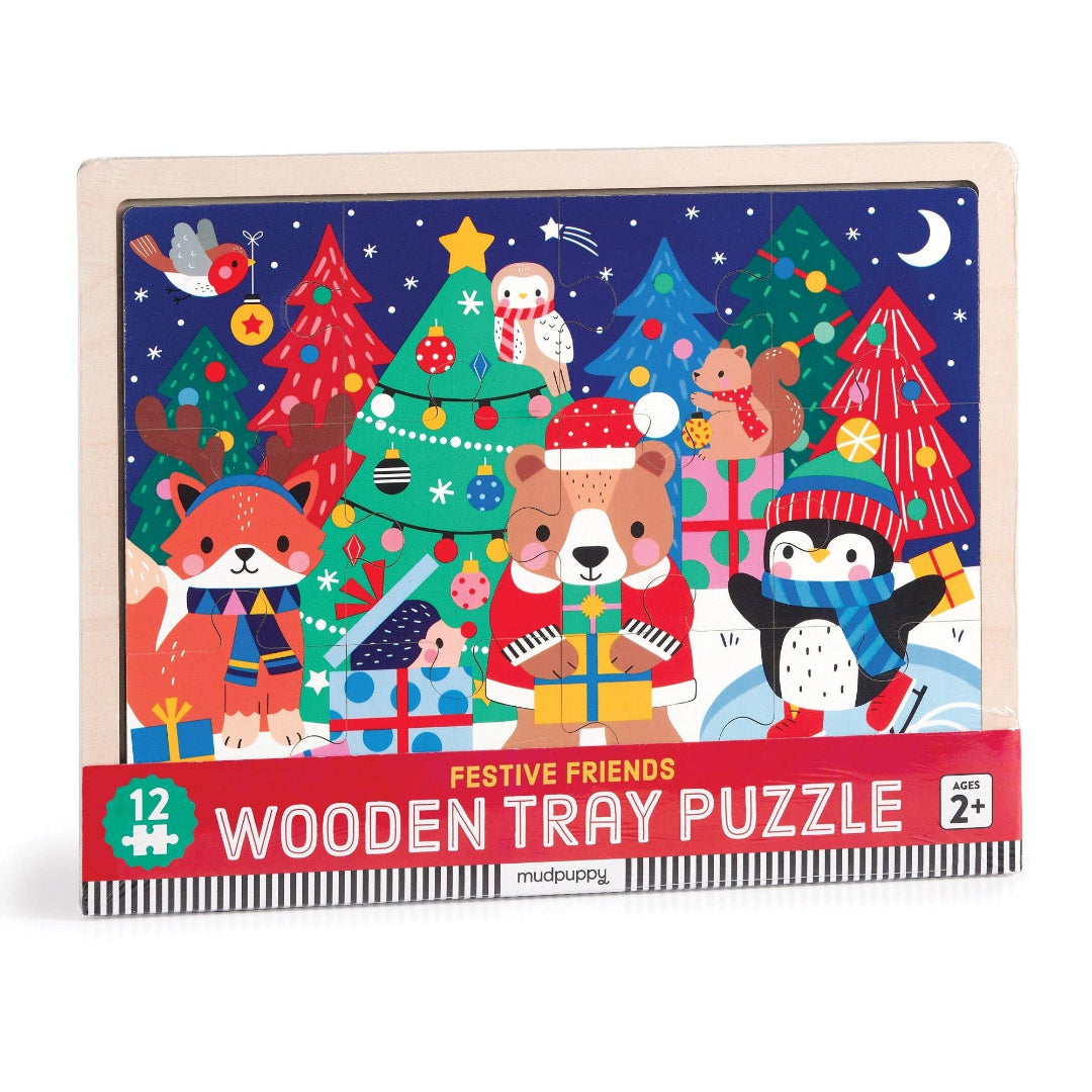 Wooden tray puzzle with festive illustrations of animals and Christmas trees on a blue background.