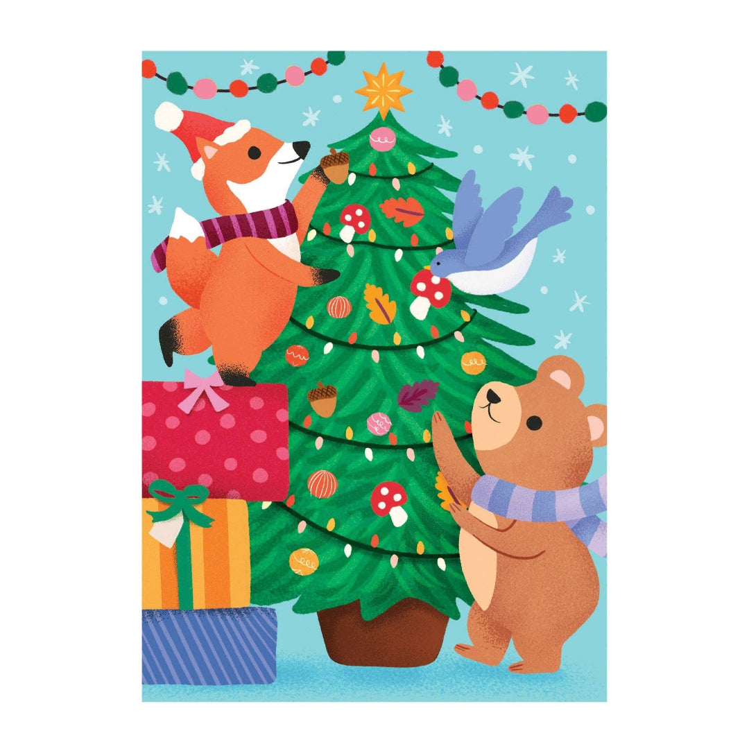Illustration of a fox and bear decorating a Christmas tree with presents and lights on a blue background.