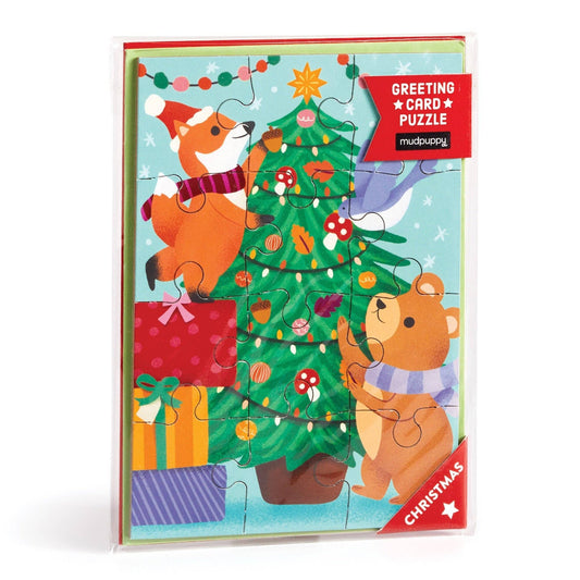 Christmas-themed puzzle greeting card with a fox, bear, and tree design.