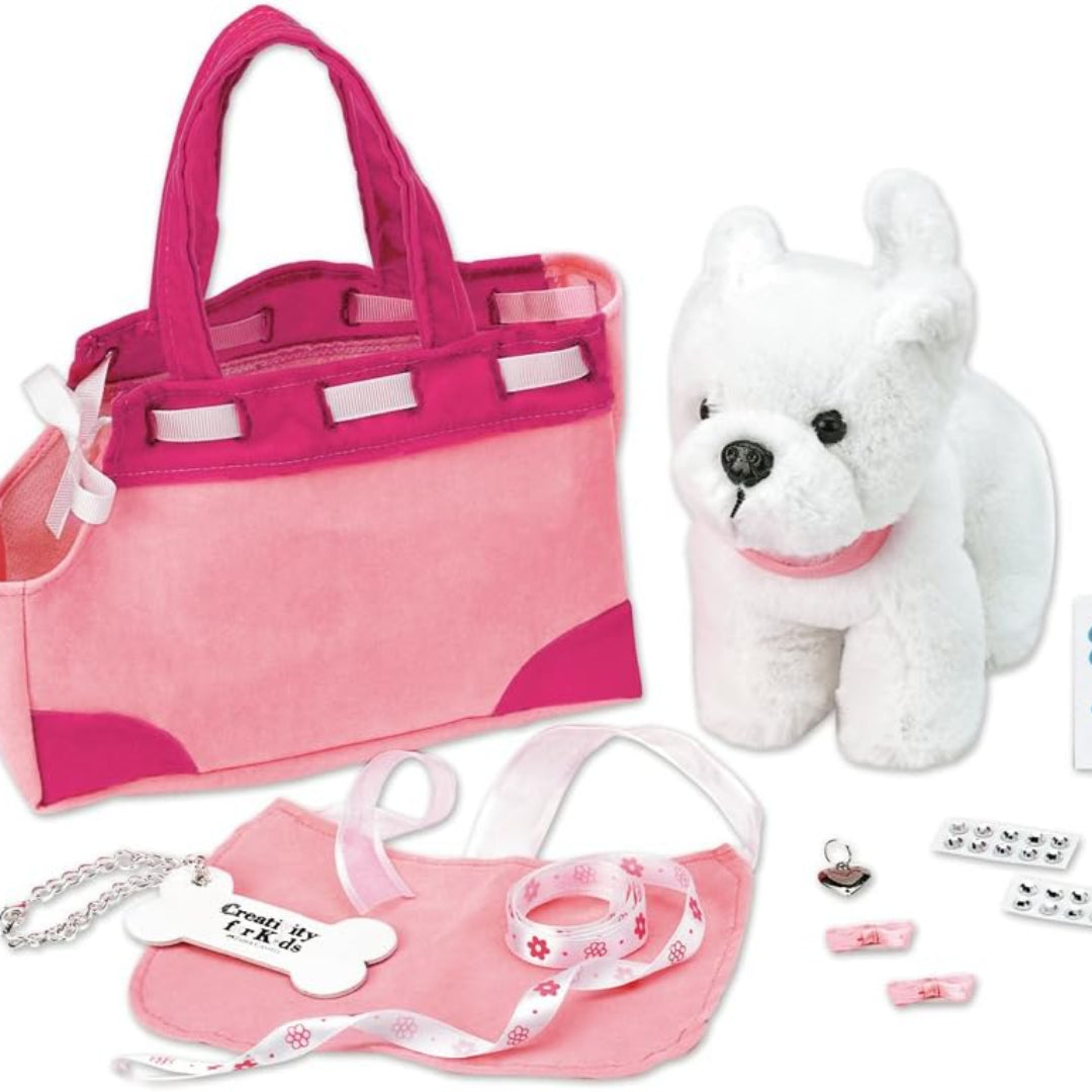 Toy set with pink handbag, plush dog, and accessories on a white background