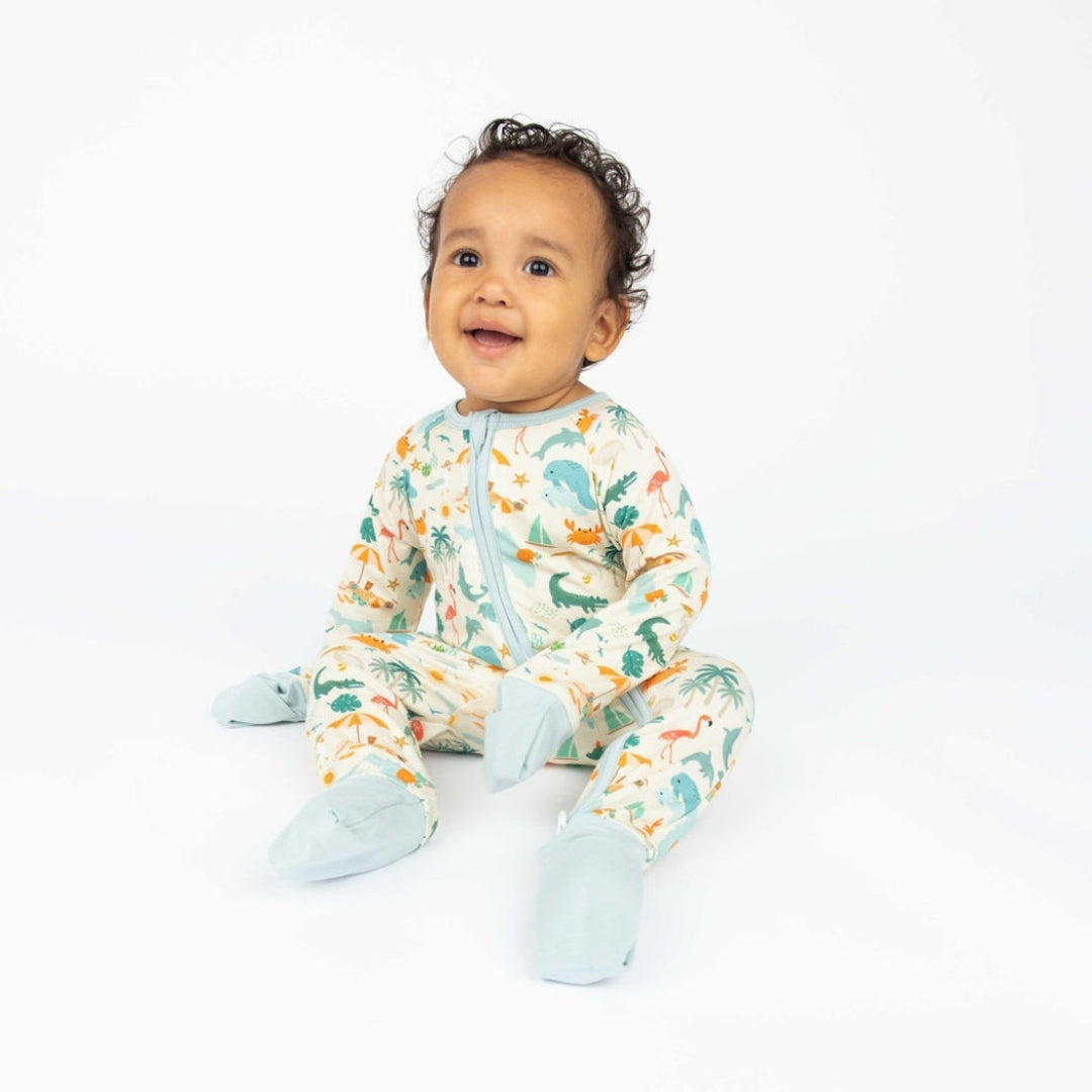 Soft and breathable bamboo convertible pajama featuring a vibrant Florida-themed print with foldable hand and feet covers for babies and toddlers.