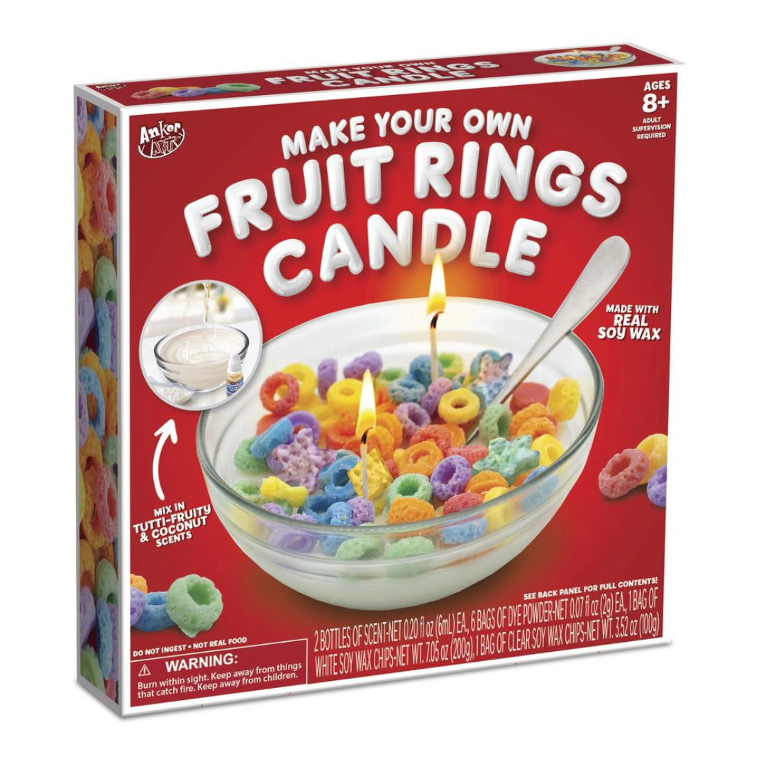 a red box of fruit ring cereal in a bowl with candles in it on a white background