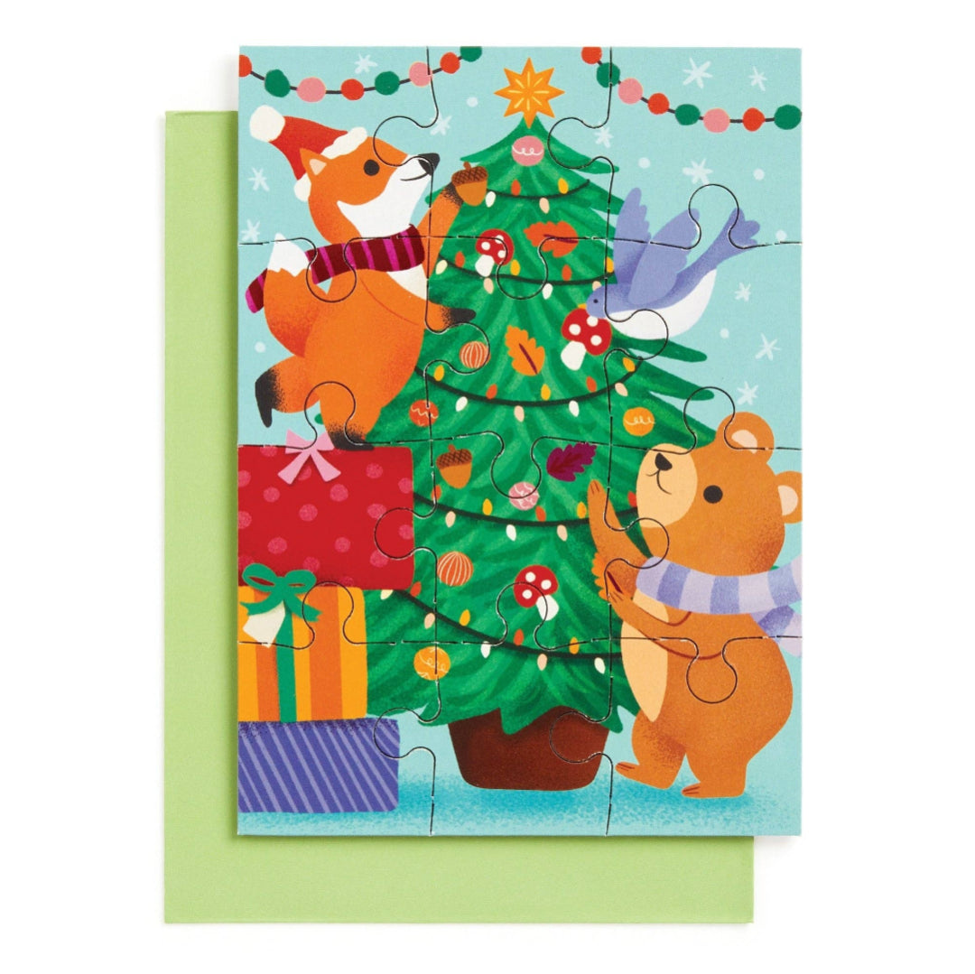 Children's puzzle with cartoon animals around a Christmas tree on a light blue background