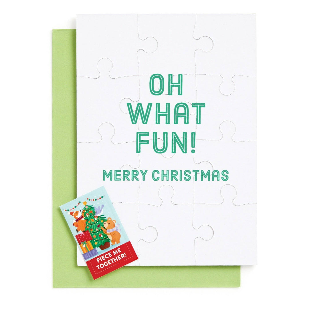 Christmas puzzle with 'Oh What Fun! Merry Christmas' text and a small card on a white background