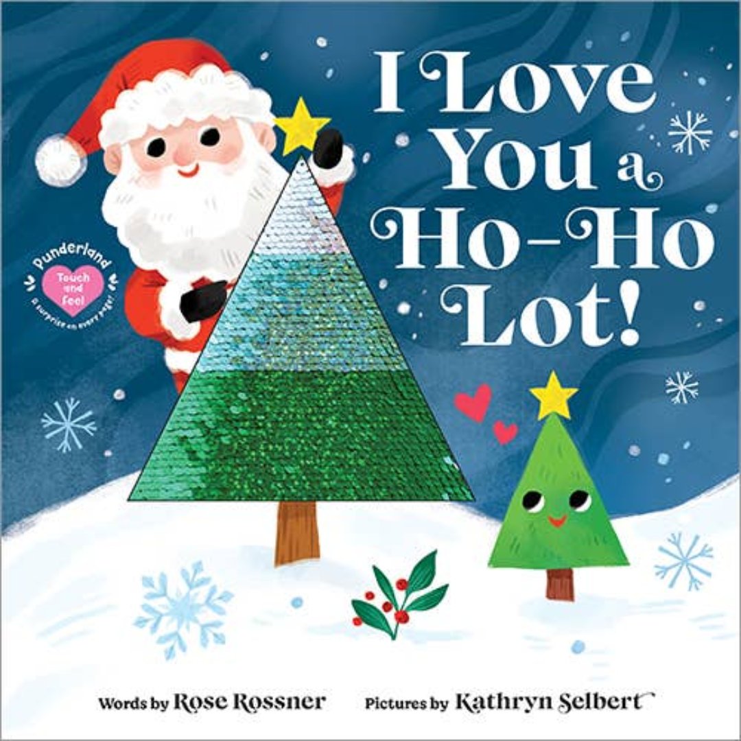 board book with santa claus on the front adding a star to the top of a christmas tree