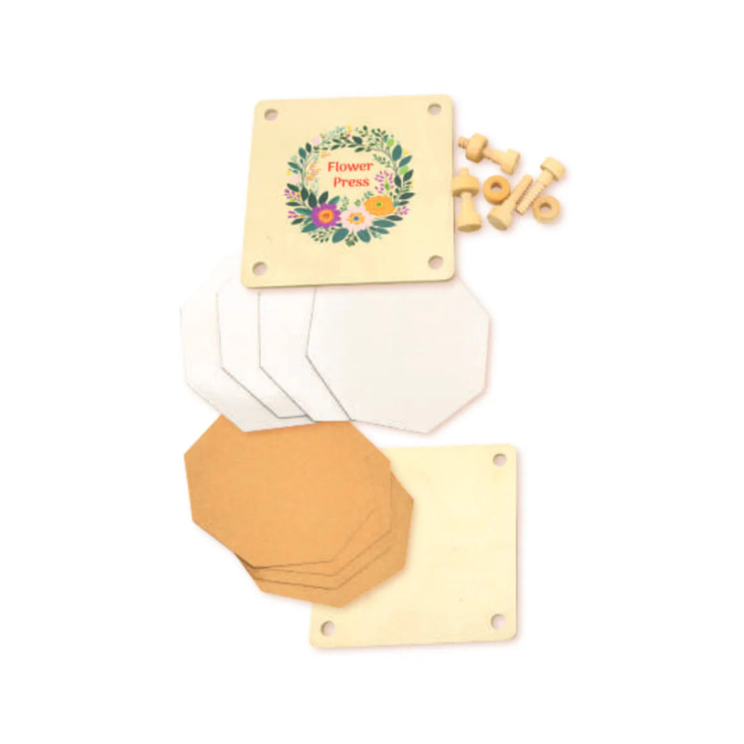 Flower press with wooden components on a white background