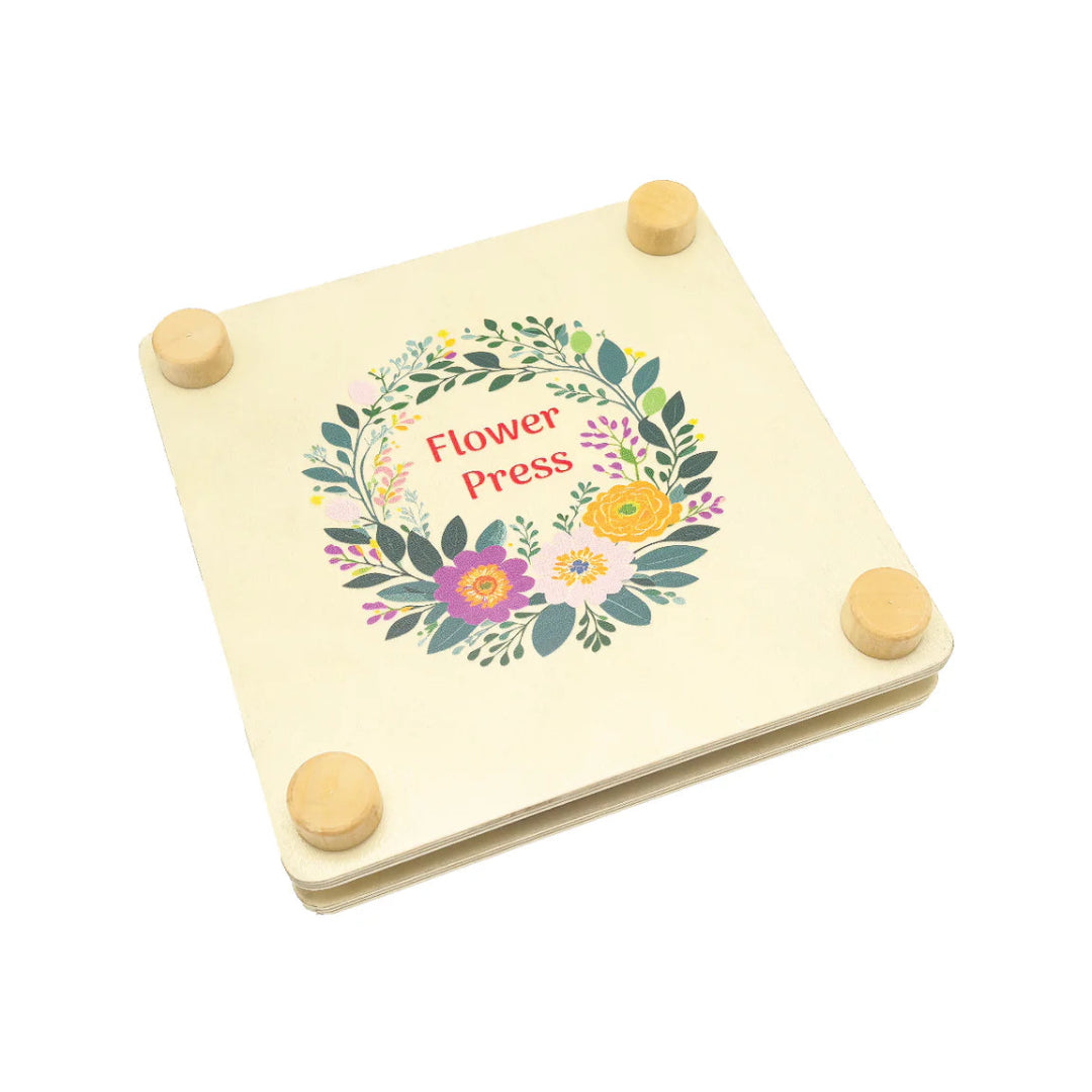 Wooden flower press with floral design and 'Flower Press' text on a white background