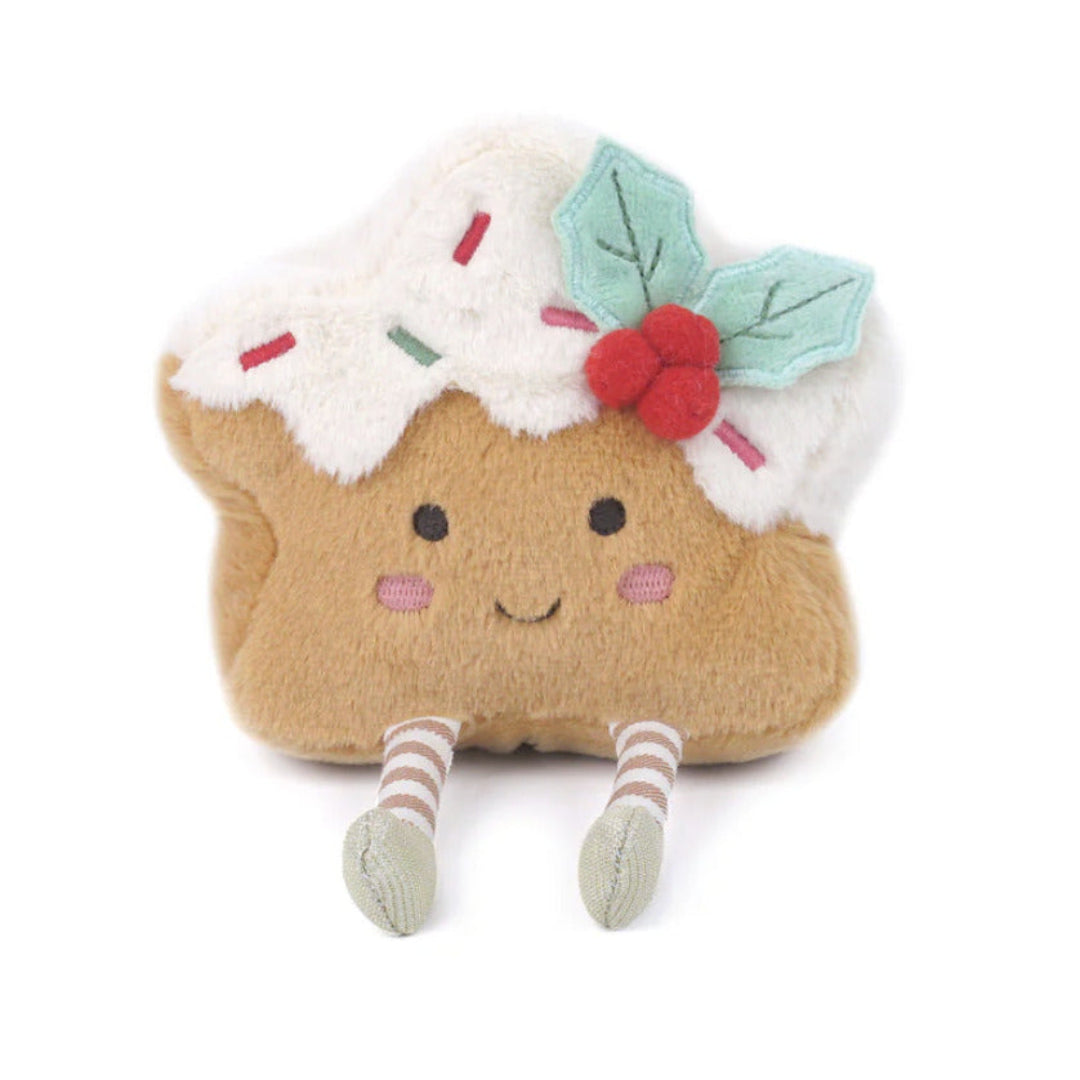 Plush Christmas star shaped cookie stuffed toy with smiling face, white icing, colorful sprinkles, holly decoration, and striped legs