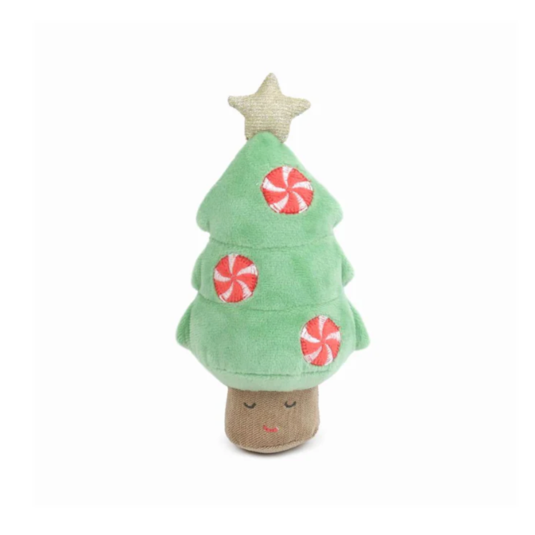 Toy Christmas tree with peppermint candy decorations on a white background