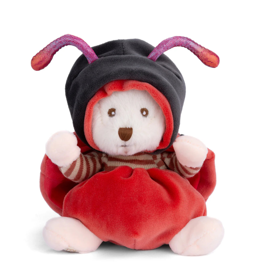 White bear plush dressed as a lady bug