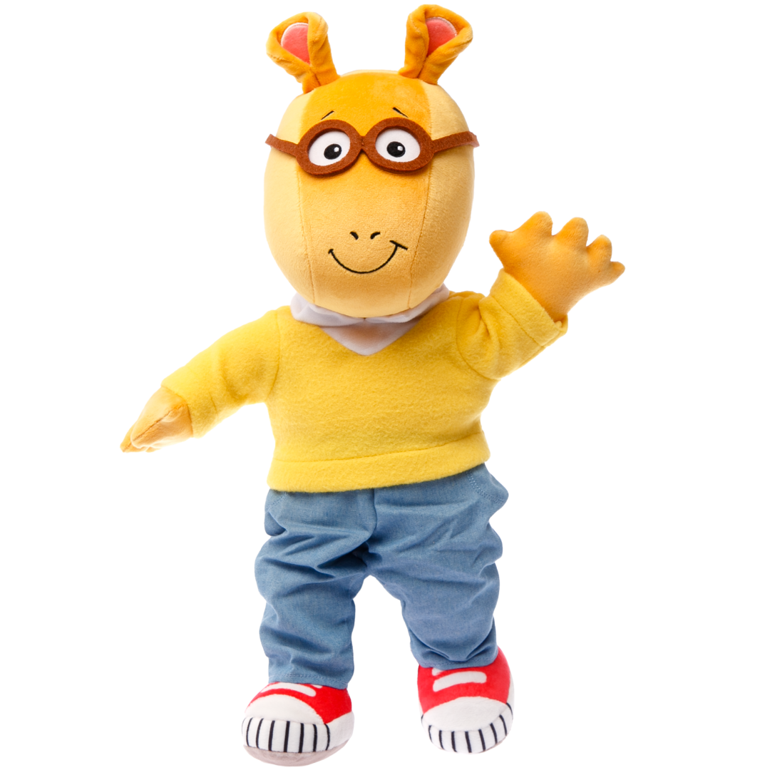 A plush toy of Arthur, a cartoon aardvark, wearing a yellow sweater, blue pants, and red sneakers, waving cheerfully.
