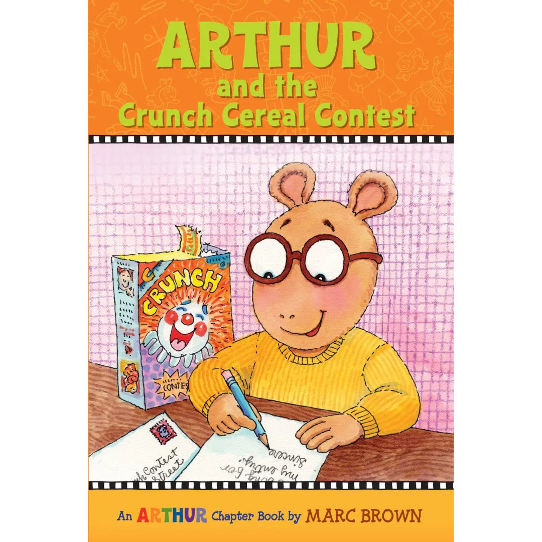 Arthur sitting at the table with a box of cereal writing a letter