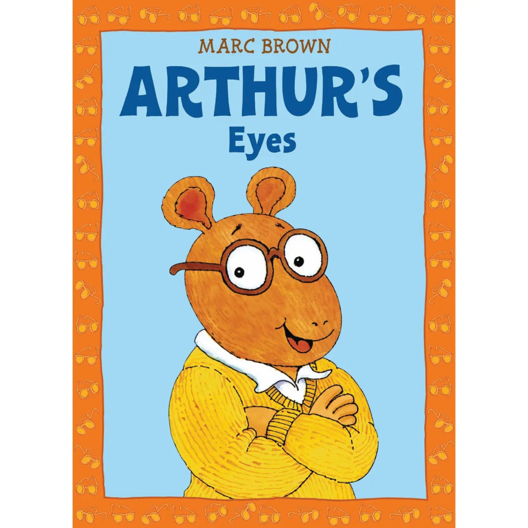 Arthur posing for a photo wearing glasses