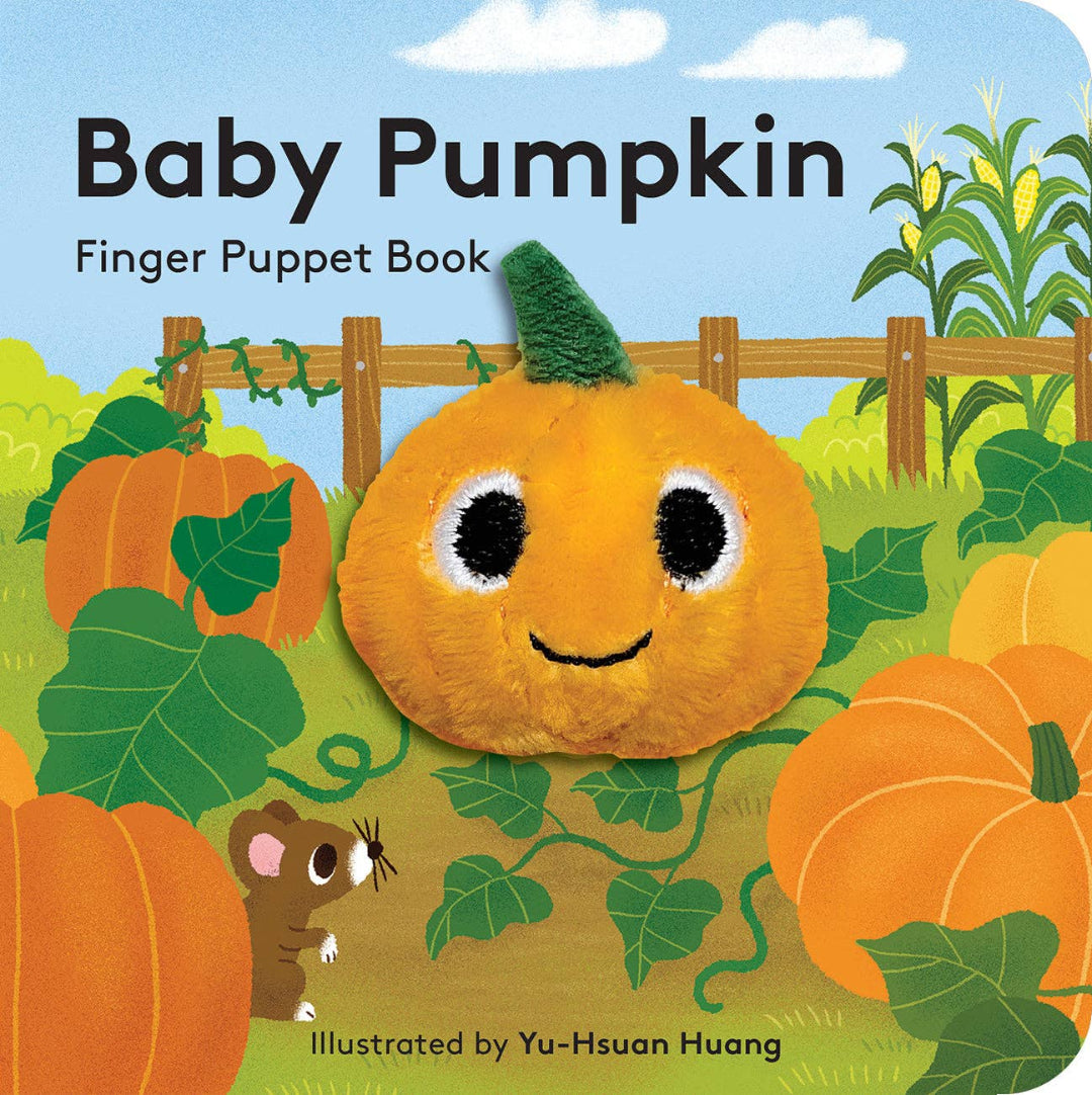a finger puppet board book with a finger puppet pumpkin on the front on a pumpkin patch