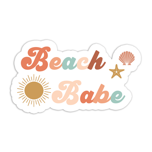 the beach babe sticker says the words "beach babe" in colorful letters (pink, peach, teal) the words are surrounded by a sun, starfish, and seashell.