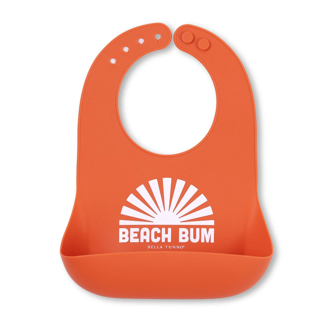 orange bib that says beach bum