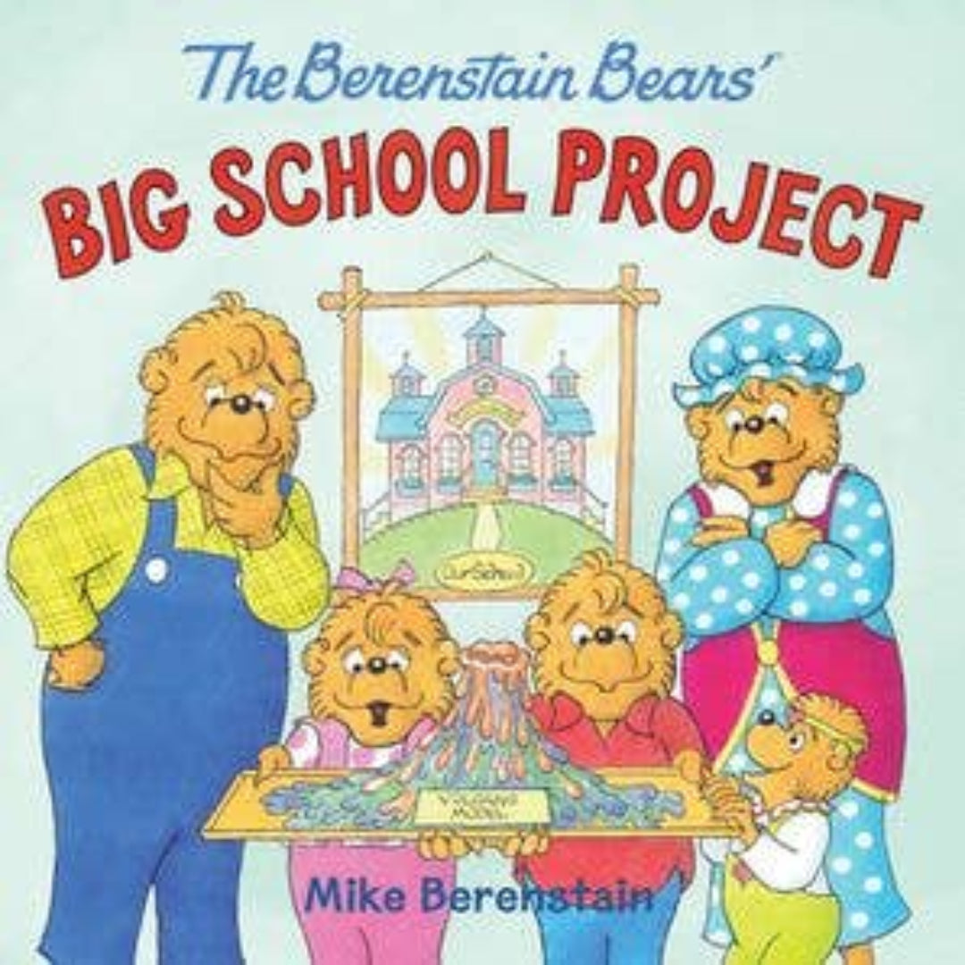 The Berenstain bears gathered around a school project thats a volcano
