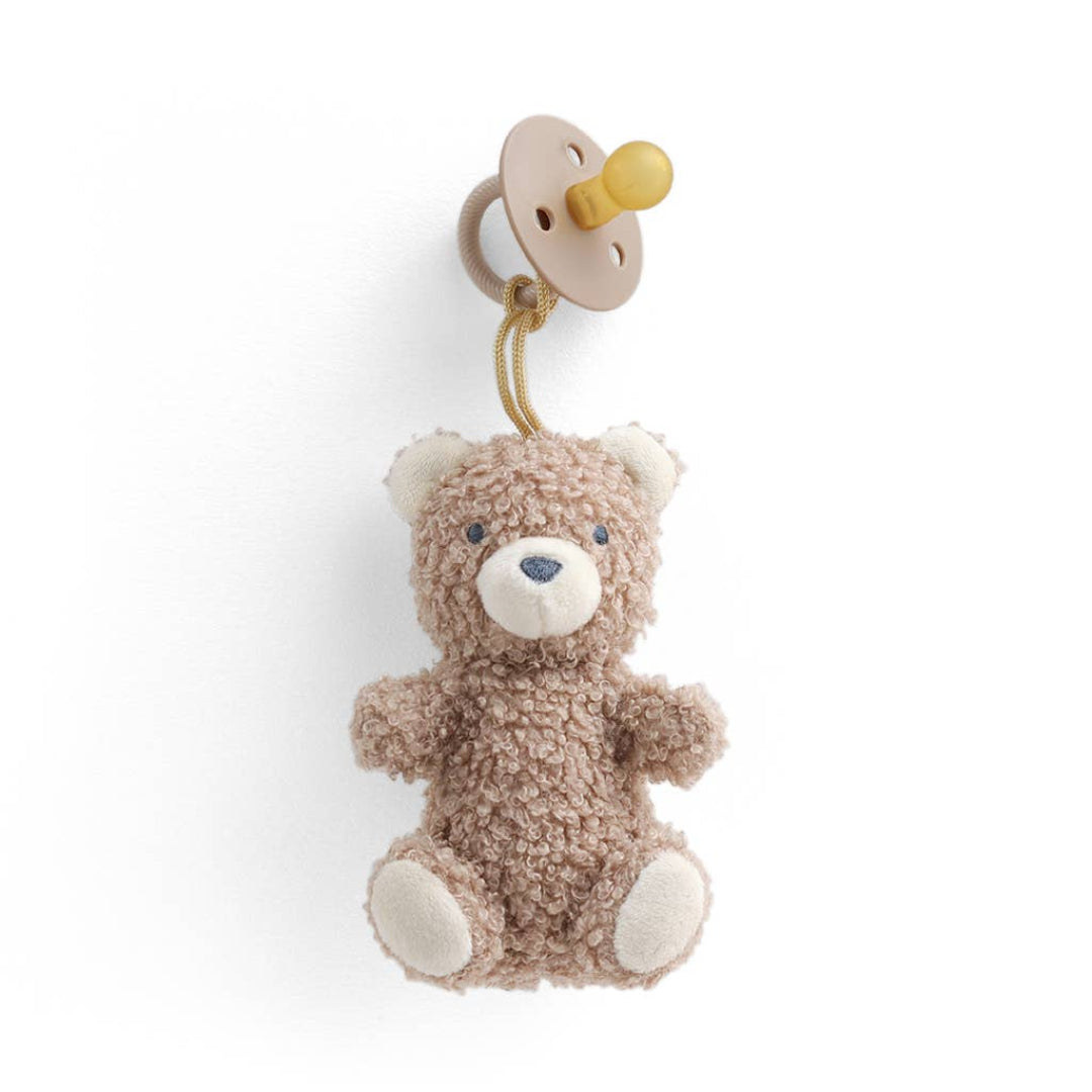 Little bear plush that attaches to a pacifier which is included