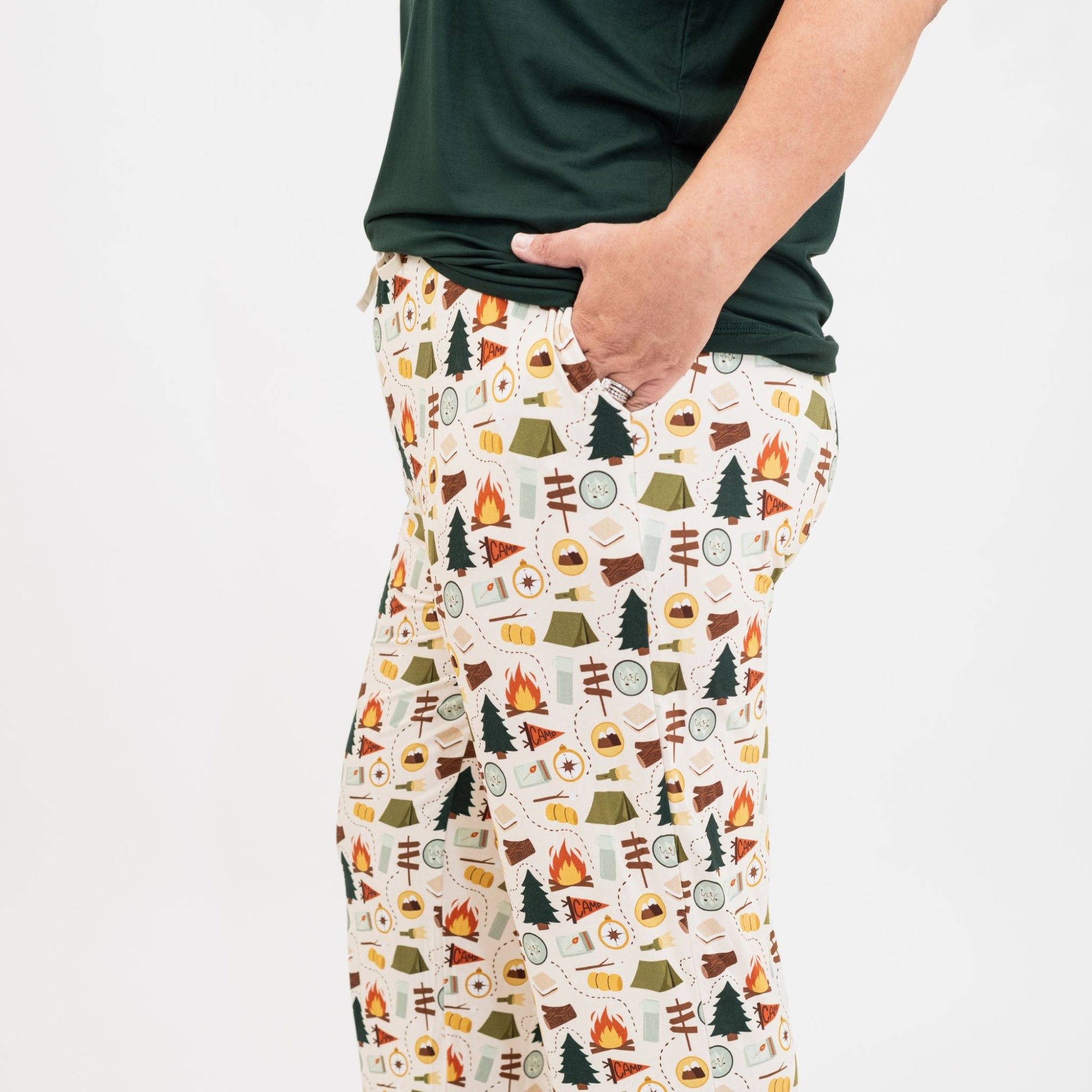 Close-up of man wearing Camp Emerson bamboo short sleeve tee with pajama pants.