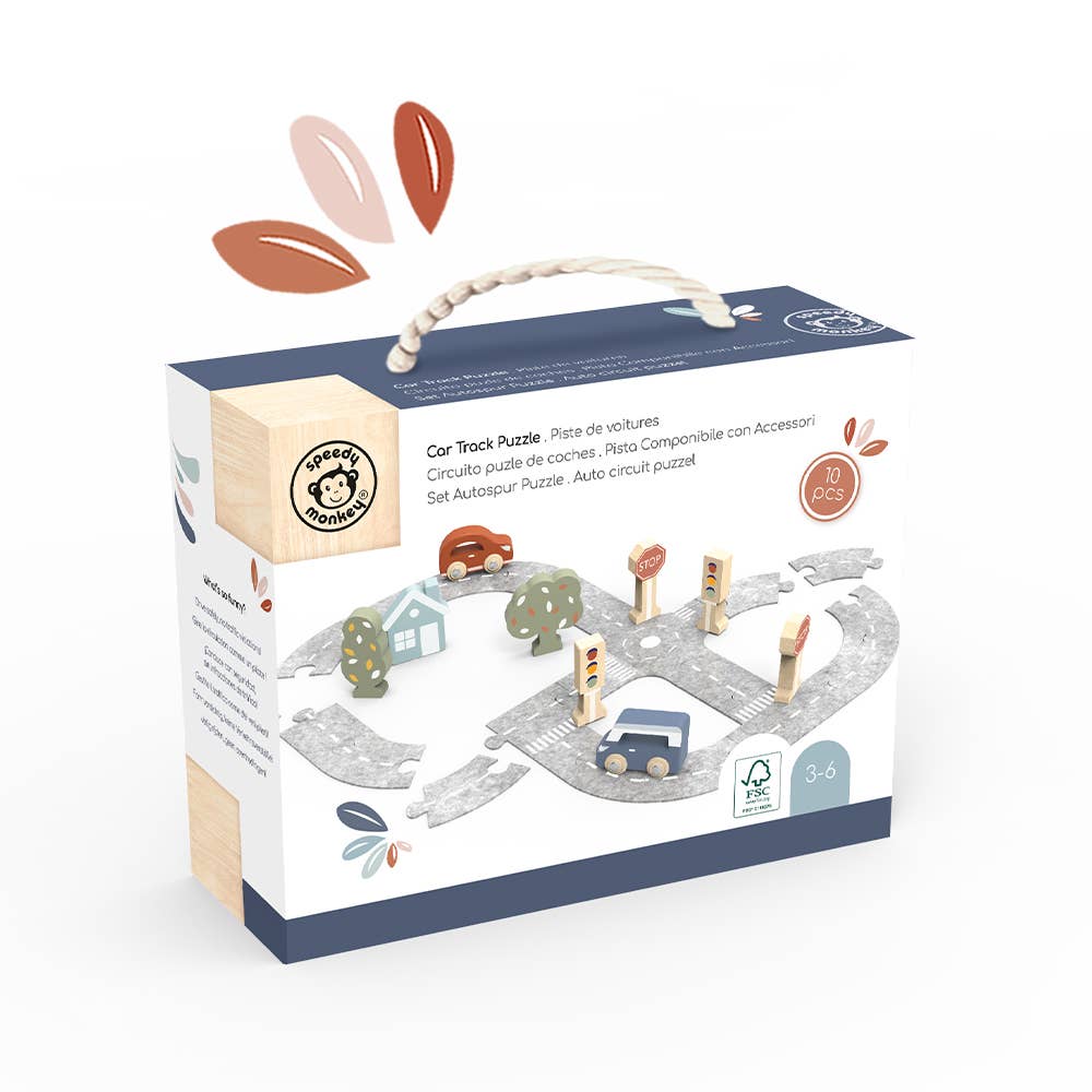 Boxed car track puzzle with toy cars and accessories on a white background