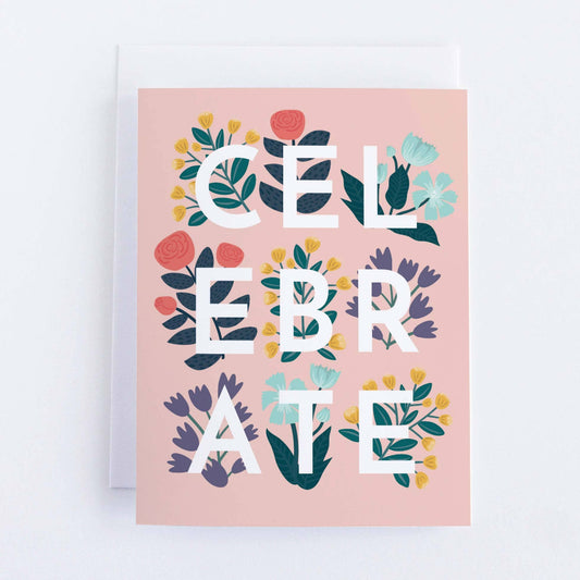 pink greeting card with floral design that says celebrate on the front