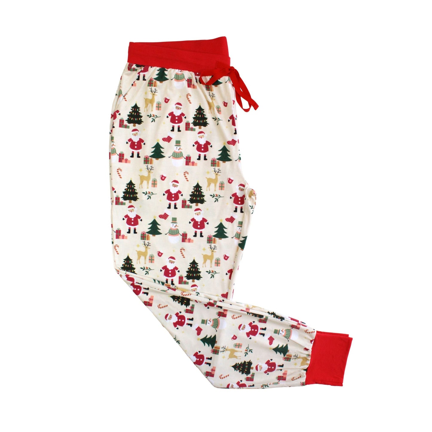 Flat lay of Cozy Christmas bamboo women’s jogger pajama pants with red cuffs and festive holiday print featuring Santa and trees.