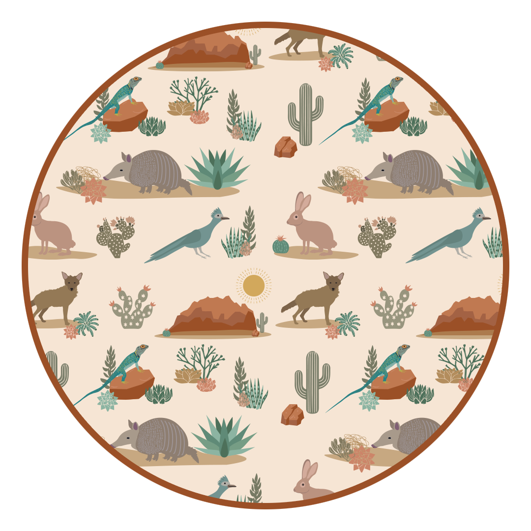 the "desert friends" print is a scattered pattern of armadillo, cacti, other desert plants, rocks, desert foxes, lizards, and desert birds. this is all on a beige background.