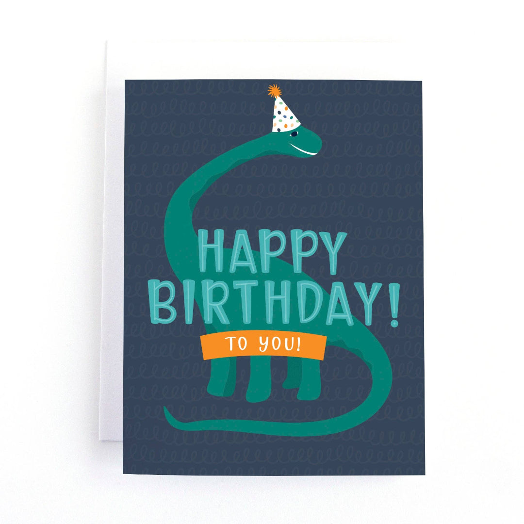 birthday card with a big dinosaur on the front that says happy birthday to you