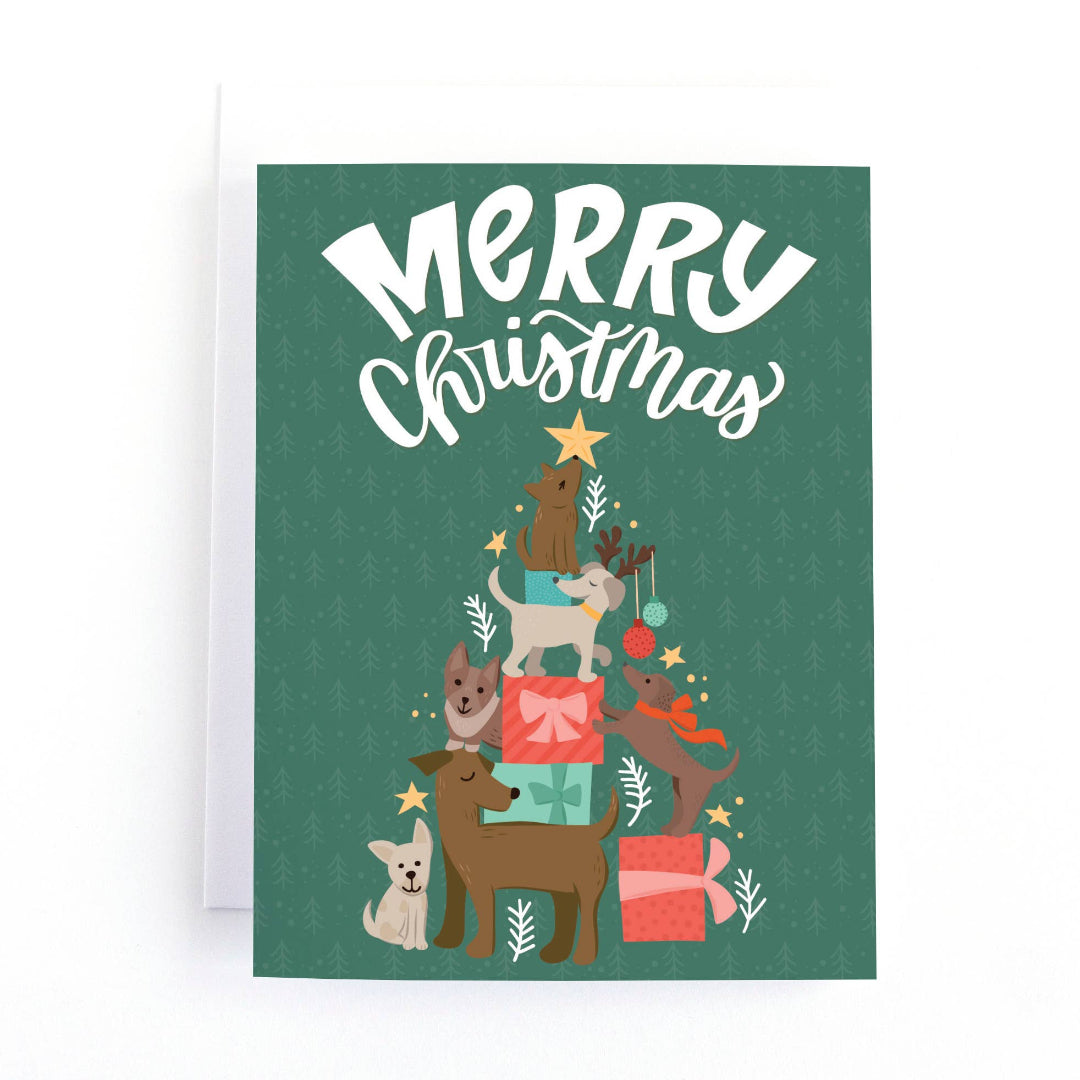 christmas card that says merry christmas and has a bunch of dogs in the shape of a christmas tree