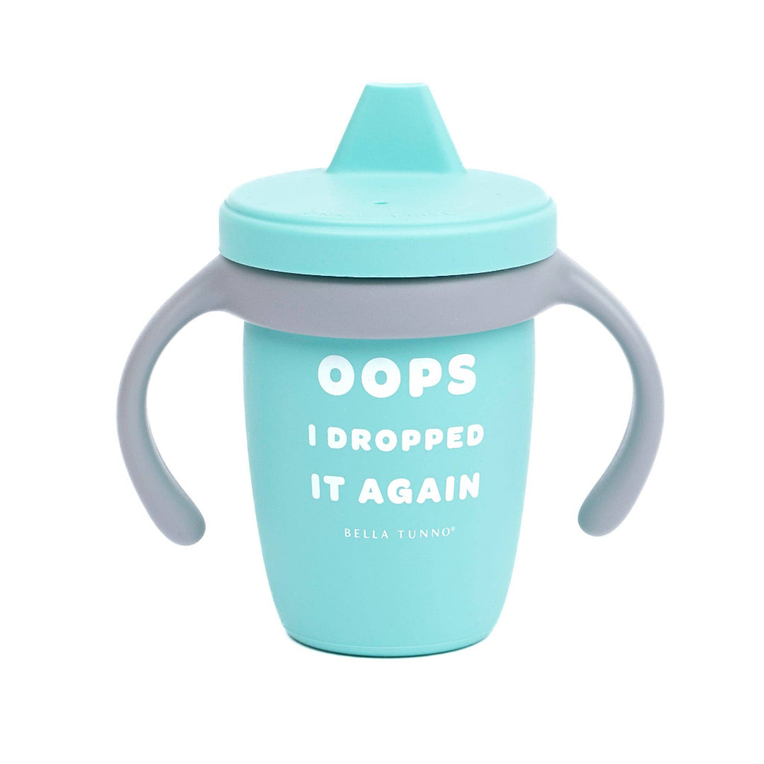 teal blue sippy cup with gray handles and it says oops I dropped it again in white letters