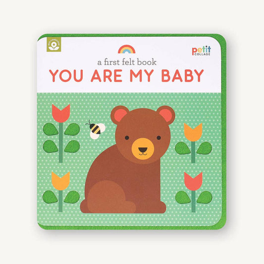 baby book made out of felt that has a bear and flowers on the front