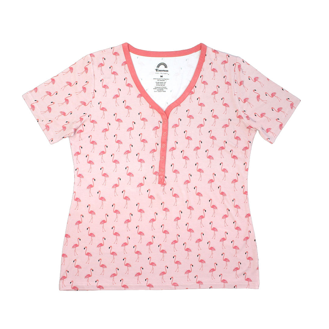 Our Fancy Flamingos women's top is a pattern of multiple pink flamingoes scattered around the print.