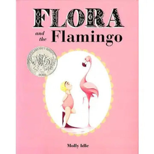 pink hard cover book with a little girl and a flamingo on the front cover