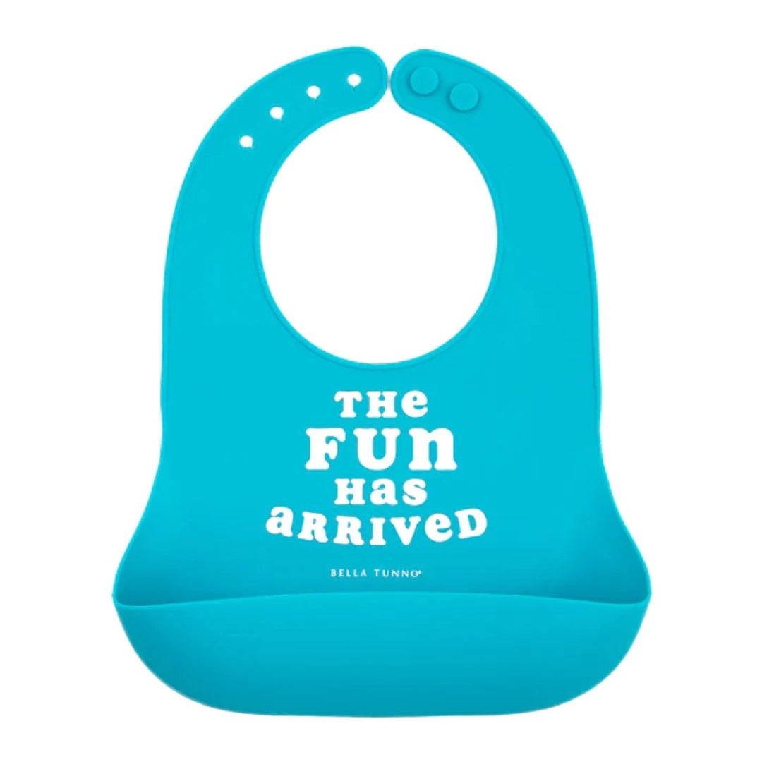 blue silicone baby bib with white writing that says the fun has arrived