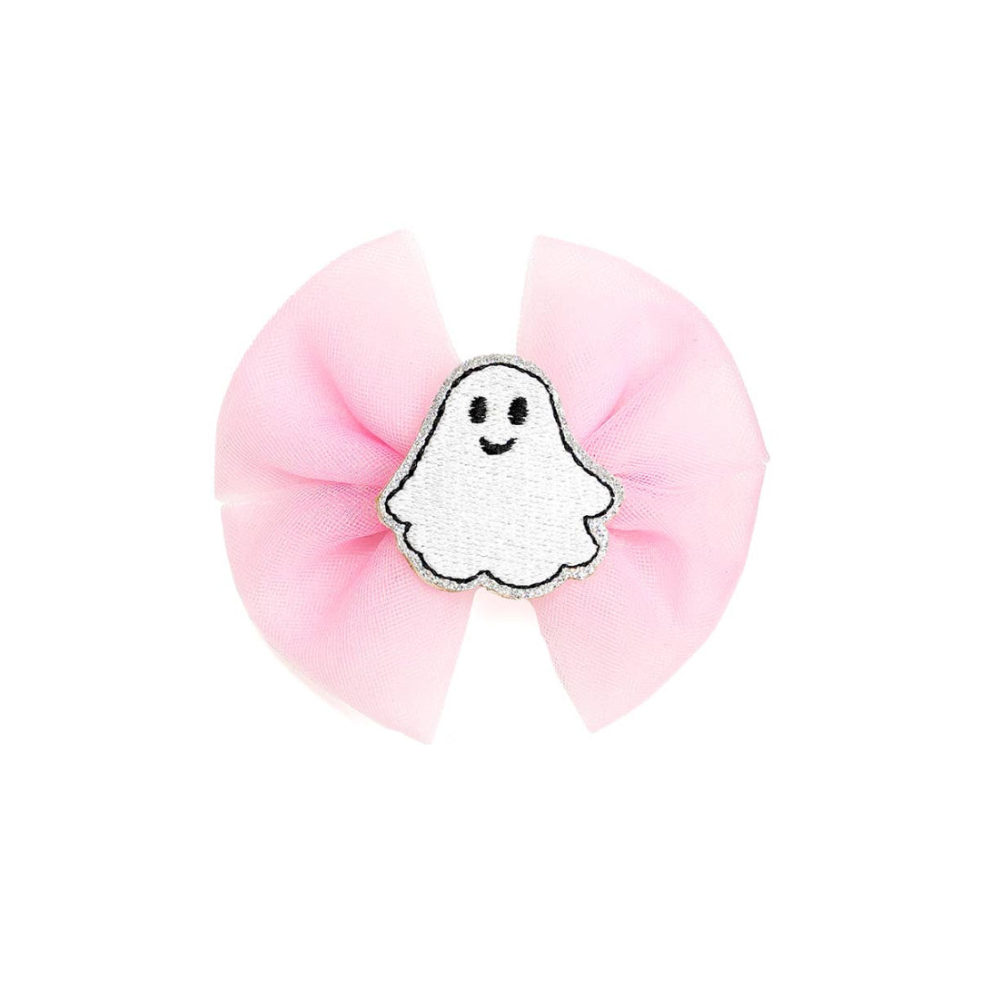 pink hair bow with a white ghost in the middle