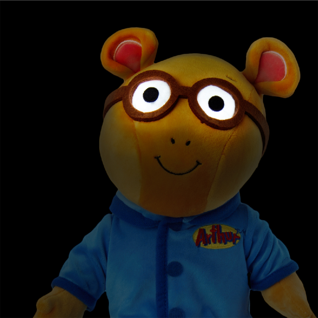 Arthur stuffed toy wearing his blue pajamas and he has eyes that light up at night.