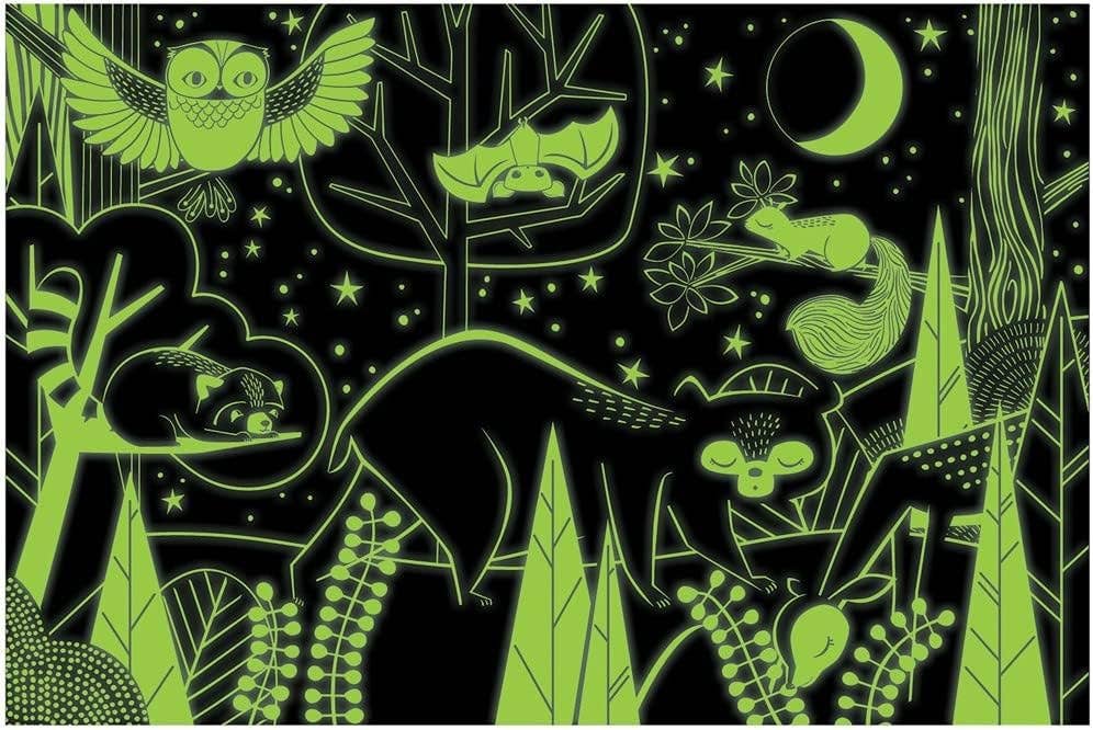 Glowing green animals and plants on a black background