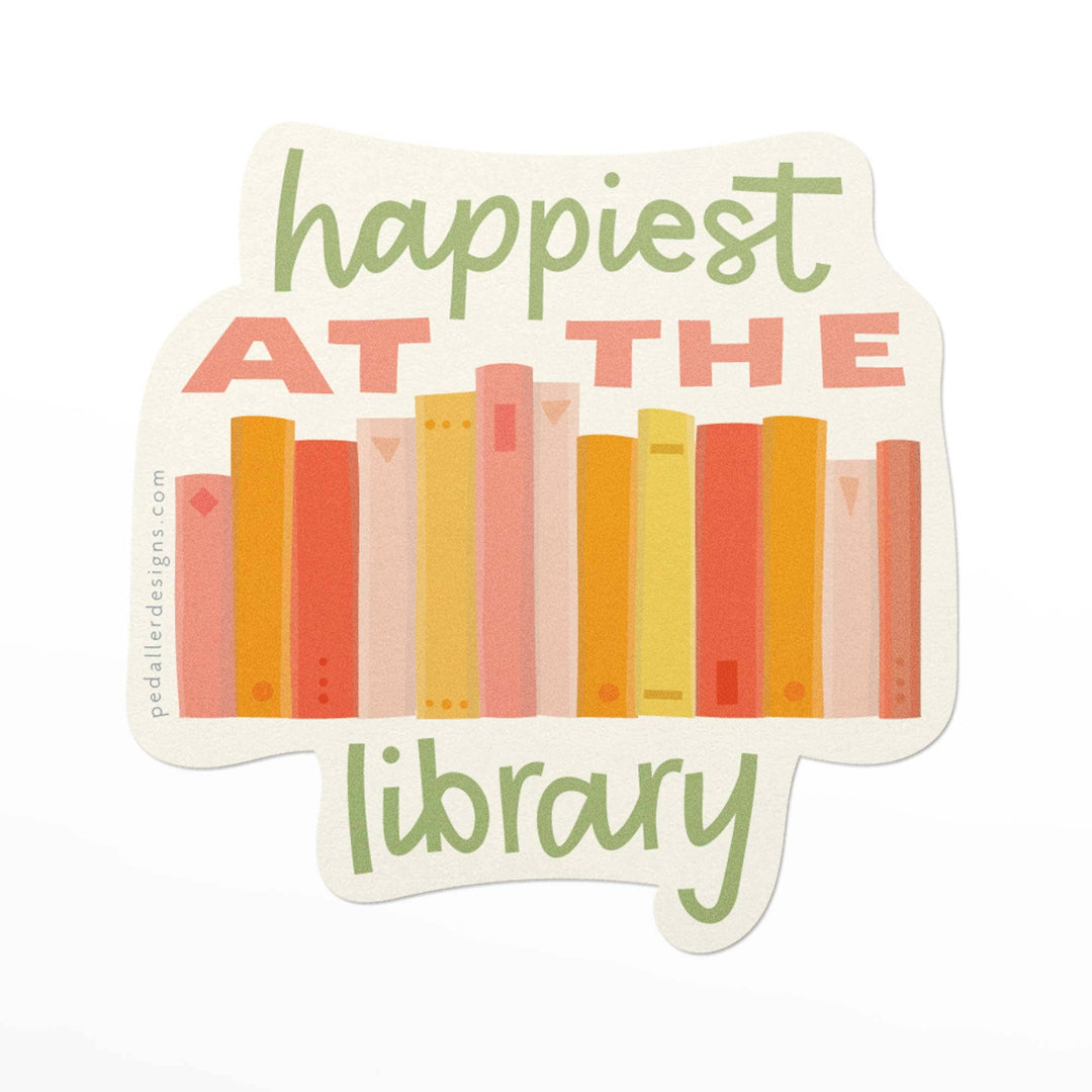 sticker that reads happiest at the library and has books on it