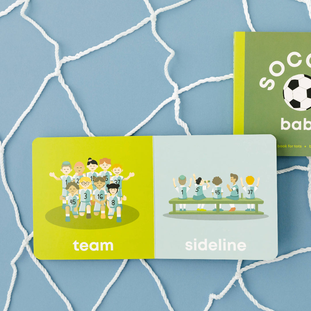 Two children's books on a blue textured background with soccer theme
