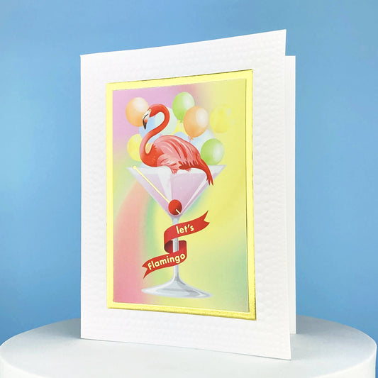 a birthday card that says lets flamingo that has a flamingo in a martini glass on the front