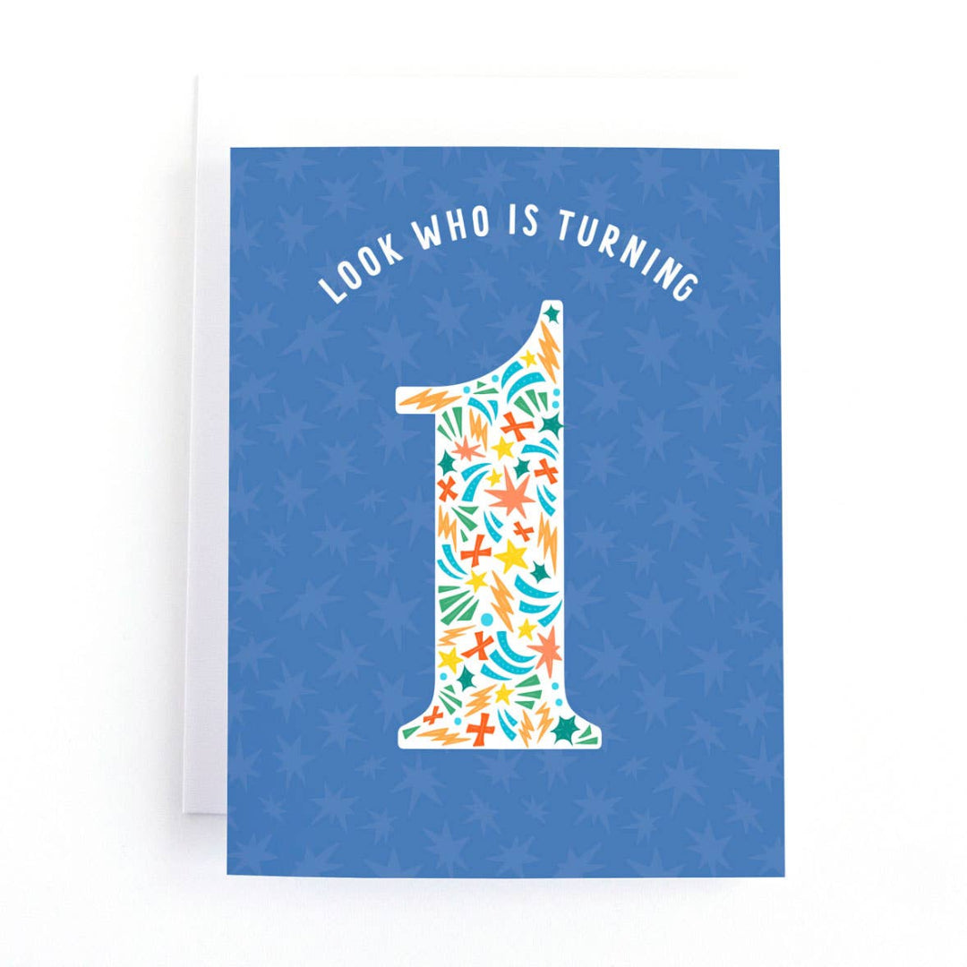 blue greeting card that says look who is turning 1