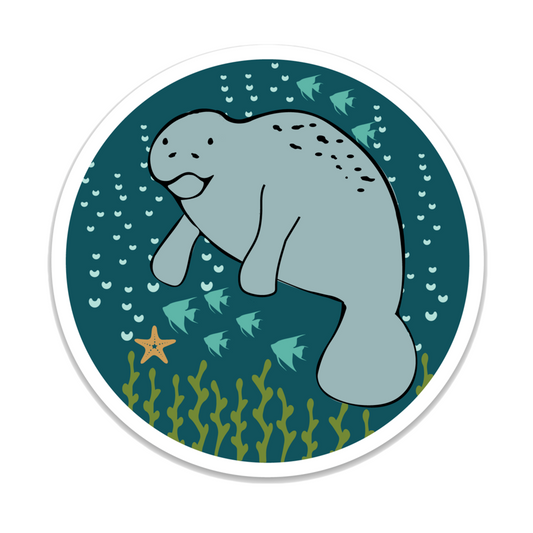 a manatee is centered in the middle of a blue sticker. the manatee is surrounded by sea life that includes starfish, fish, and seaweed. you can also see bubbles.