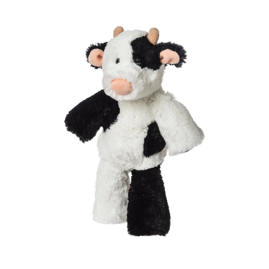 black and white stuffed cow