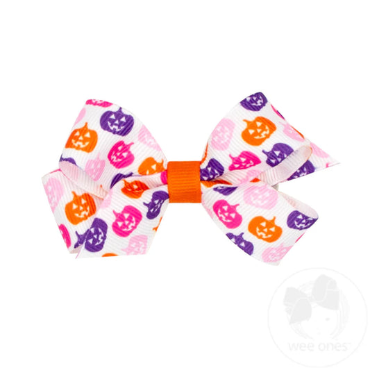 mini size white halloween hair bow with pink, purple, and orange pumpkins